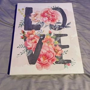 A sign that says love